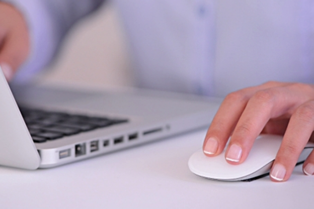 closeup of person using laptop